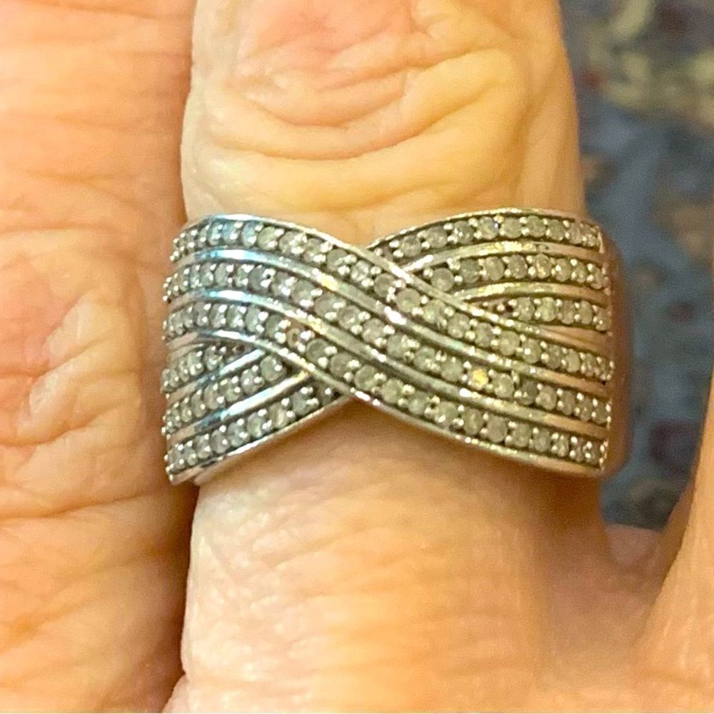 Size 7 Diamond band . .50 ctw cross cross design . Rhodium plate